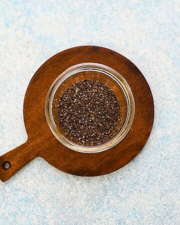 black chia seeds in a glass jar.