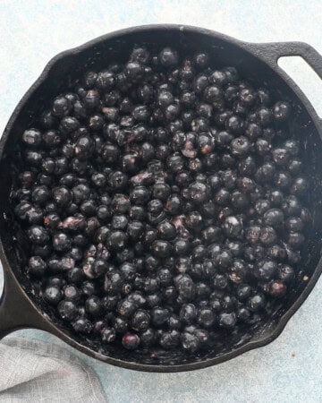 blueberries in a black skillet.