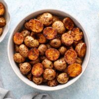 roasted baby potatoes in a white bowl.