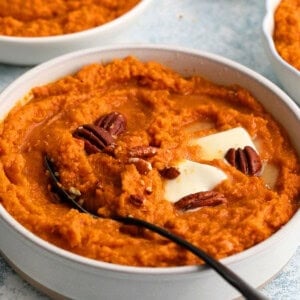 mashed sweet potatoes in a white bowl.